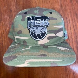 New Era Nets Cammo Snapback Hat